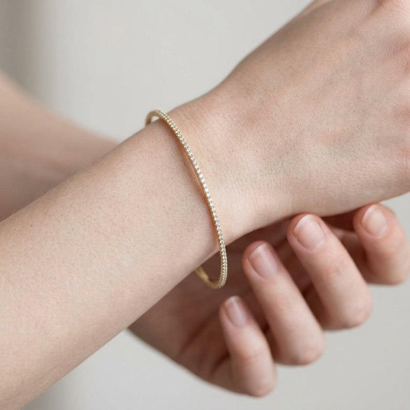 Worn: Accented Bangle Bracelet · 1–5 ct — AI-rendered styling image