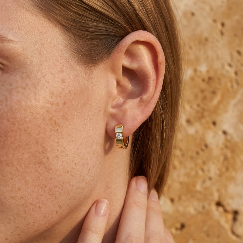 Worn: Accented Huggie Hoop Earrings · 0.13–0.33 ct — AI-rendered styling image