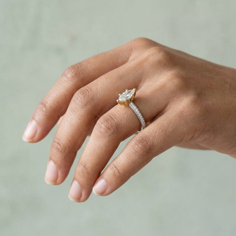 Worn: Accented Shank Marquise Engagement Ring · 0.5–1.5 ct — AI-rendered styling image