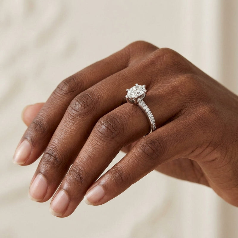 Worn: Accented Shank Pear Engagement Ring · 0.5–1 ct — AI-rendered styling image