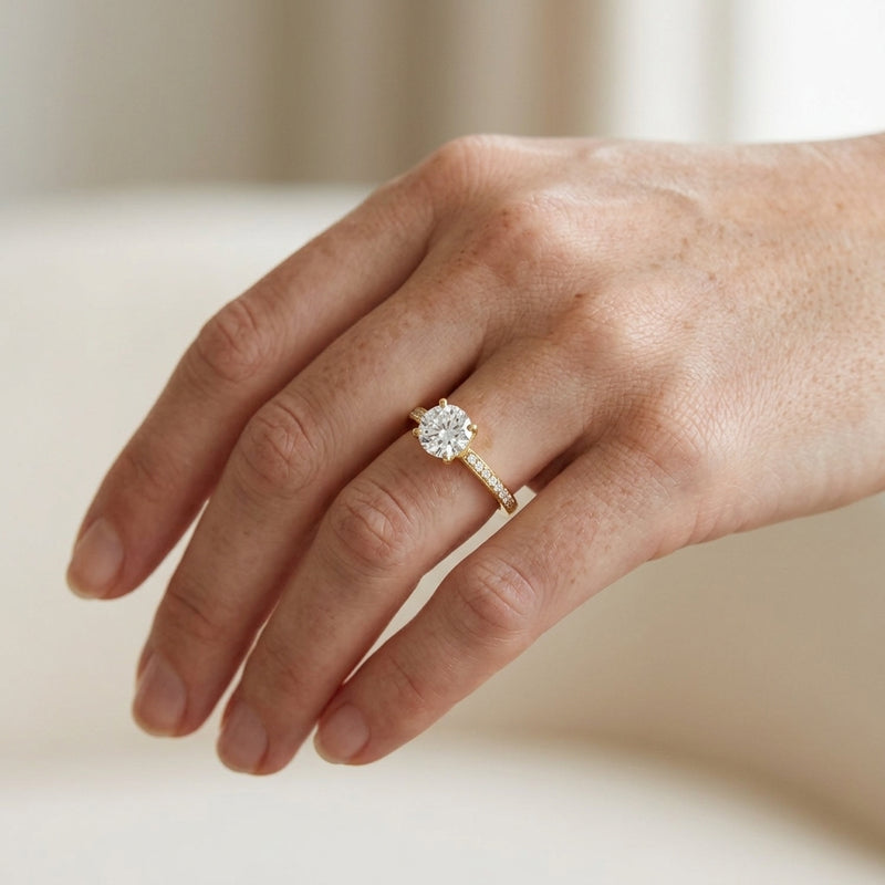 Worn: Accented Shank Round Engagement Ring · 0.5–3 ct — AI-rendered styling image