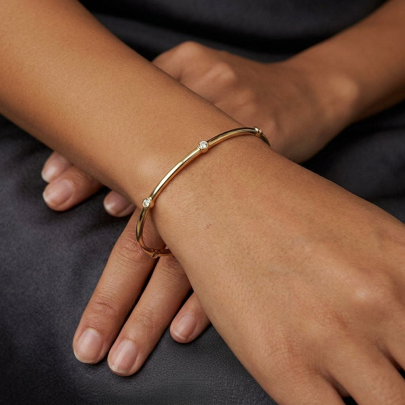 Worn: Bezel-Set Bangle Bracelet · 0.25 ct — AI-rendered styling image