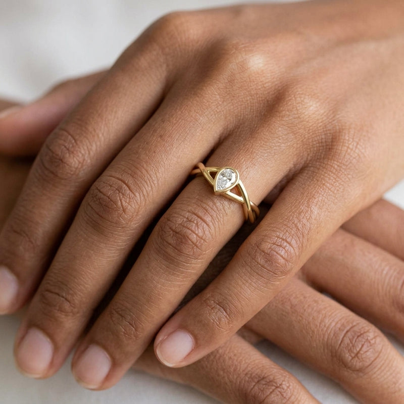 Worn: Bezel-Set Criss-Cross Solitaire Ring · 0.17 ct — AI-rendered styling image