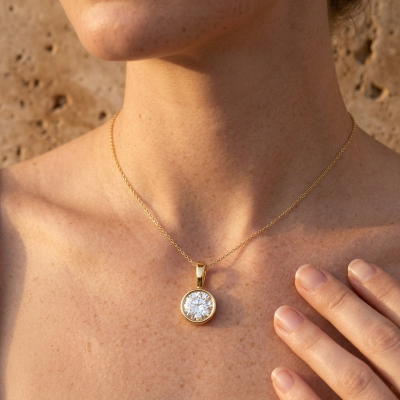 Worn: Bezel-Set Solitaire Necklace · 4.25–7.5 ct — AI-rendered styling image