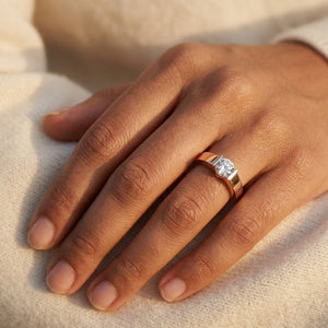 Worn: Channel-Set Solitaire Engagement Ring · 0.5–1 ct — AI-rendered styling image