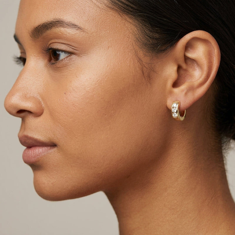 Worn: Hinged Hoop Earrings · 0.33–0.63 ct — AI-rendered styling image