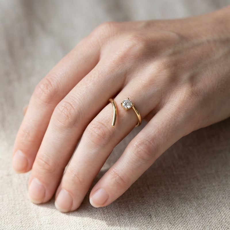Worn: Negative Space Ring · 0.25–0.33 ct — AI-rendered styling image