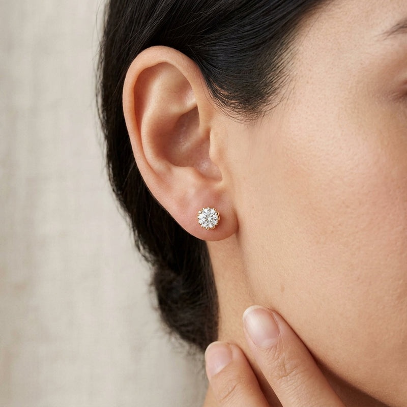 Worn: Round 3-Prong Scroll Stud Earrings · 0.2–0.5 ct — AI-rendered styling image