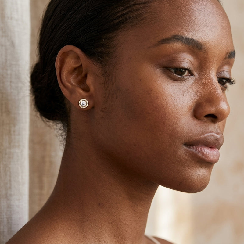 Worn: Round 4-Prong Halo-Style Earrings · 0.5 ct — AI-rendered styling image