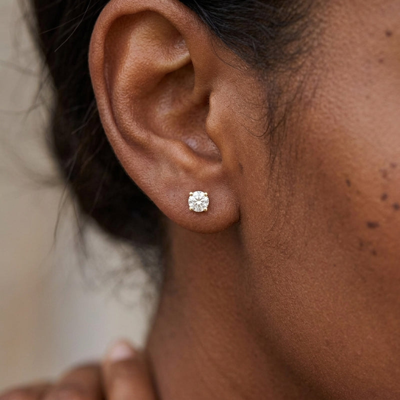 Worn: Round 4-Prong Lightweight Stud Earrings · 0.13–3 ct — AI-rendered styling image