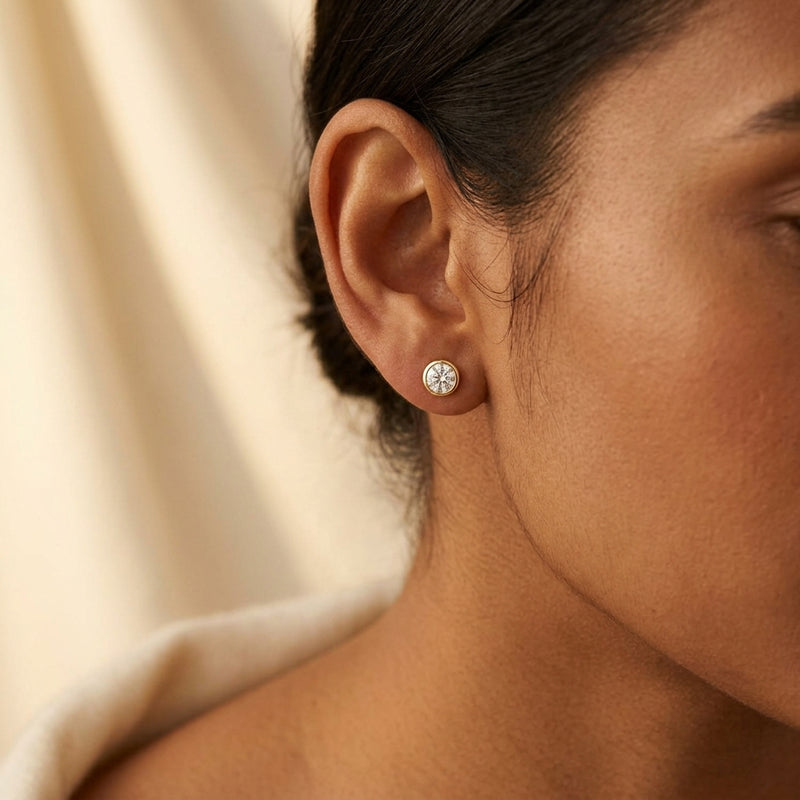 Worn: Round Bezel-Set Cocktail-Style Stud Earrings · 0.75–3.13 ct — AI-rendered styling image