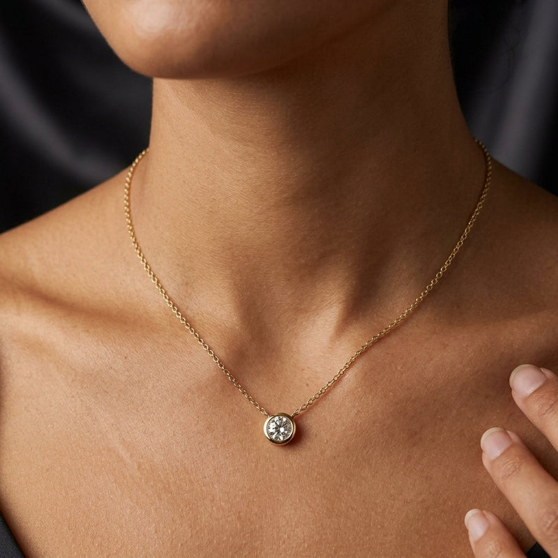 Worn: Solitaire Bezel-Set Necklace · 3.1–7.5 ct — AI-rendered styling image