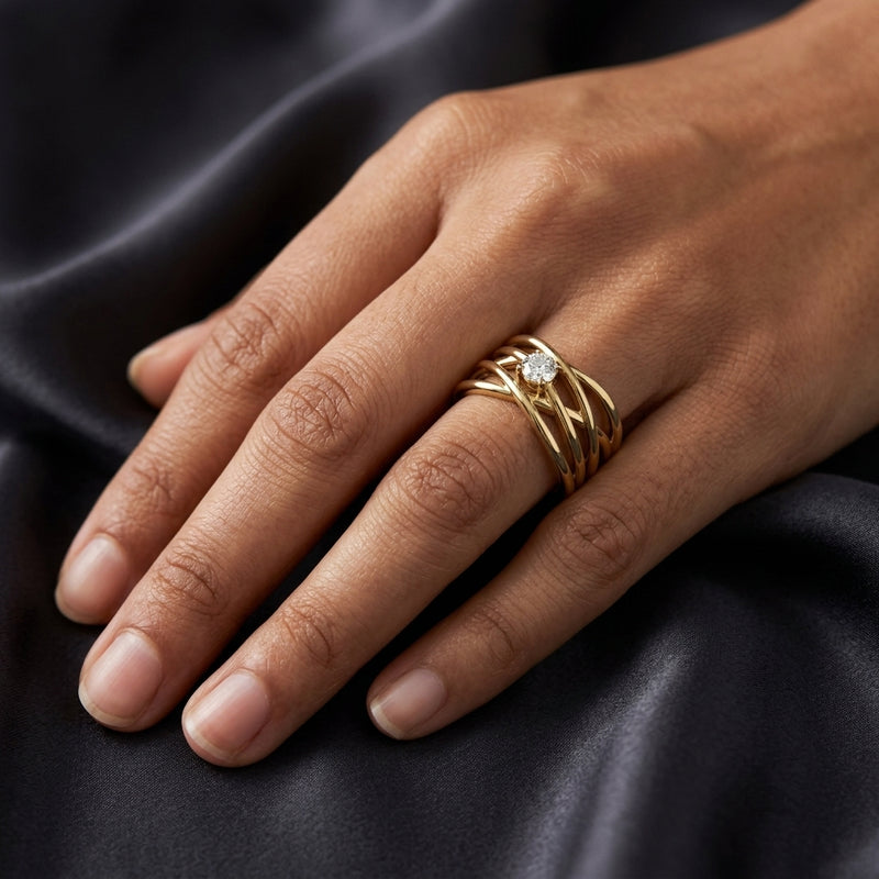 Worn: Solitaire Criss-Cross Ring · 0.25–0.5 ct — AI-rendered styling image