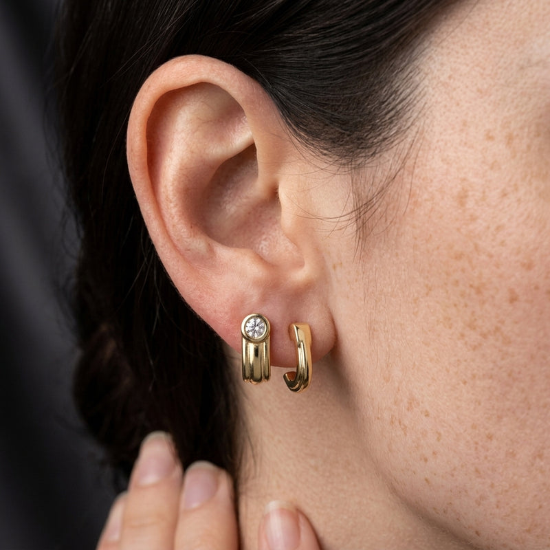 Worn: Solitaire J-Hoop Earrings · 0.2 ct — AI-rendered styling image