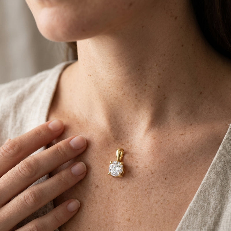 Worn: Solitaire Necklace · 4–10 ct — AI-rendered styling image